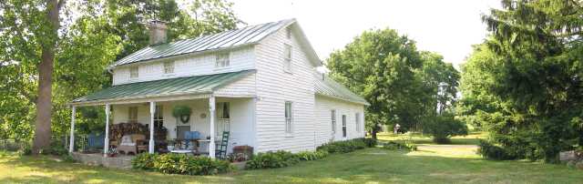 [Panoramic view of farmhouse]